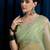 green embellished beads and stones net saree