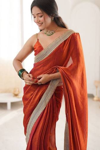 orange embellished sequinned satin heavy work saree