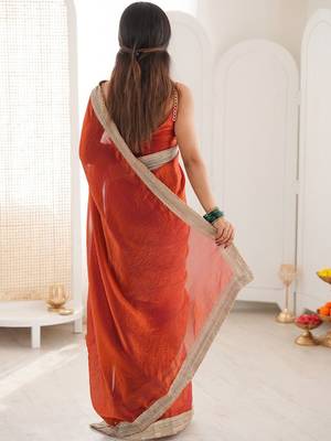 orange embellished sequinned satin heavy work saree 3