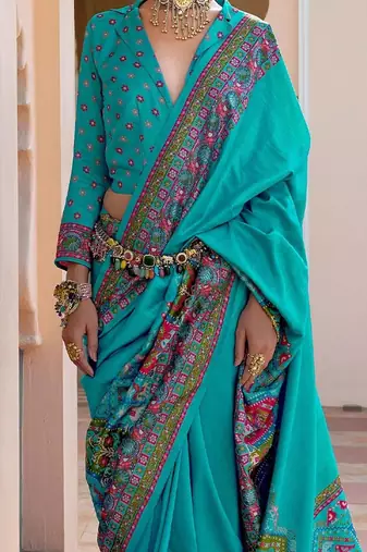Turquoise paisley silk blend designer patola saree