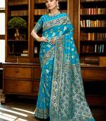 turquoise blue & gold toned woven design zari art silk blend paithani saree