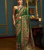 green ethnic motifs banarasi silk blend saree