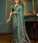 teal floral woven design banarasi silk blend saree
