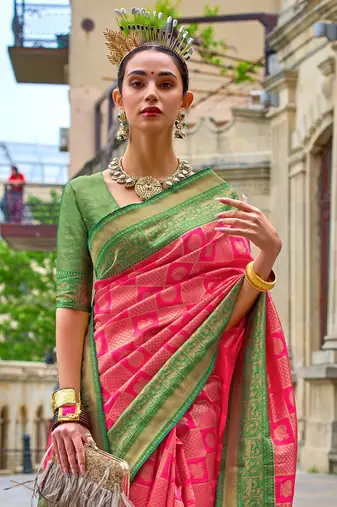 Pink woven design jaali silk blend banarasi saree