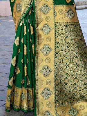 green ethnic motifs woven design zari art silk blend banarasi saree 5