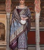 grey & maroon geometric woven design zari banarasi silk blend saree
