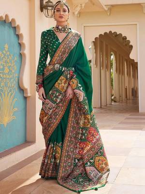 Green kalamkari embroidered silk blend designer patola saree 1
