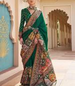 Green kalamkari embroidered silk blend designer patola saree