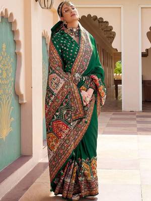 Green kalamkari embroidered silk blend designer patola saree 2