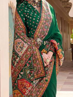 Green kalamkari embroidered silk blend designer patola saree 4