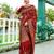 maroon & gold toned woven design floral zari organza saree
