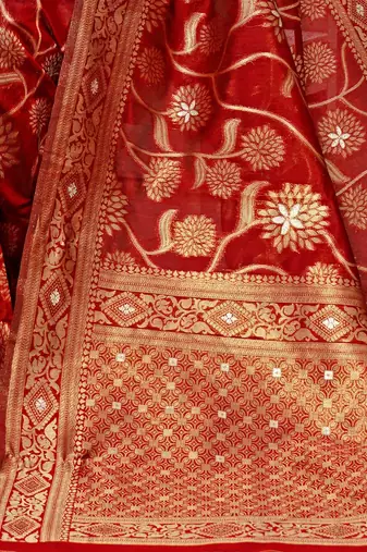 maroon & gold toned woven design floral zari organza saree