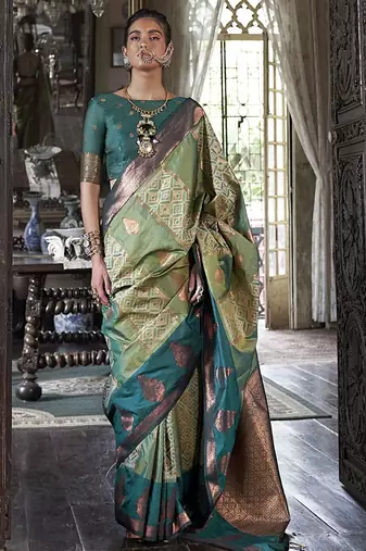 green ethnic motifs embroidered designer saree