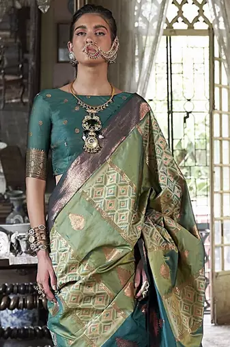 green ethnic motifs embroidered designer saree