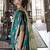 green ethnic motifs embroidered designer saree