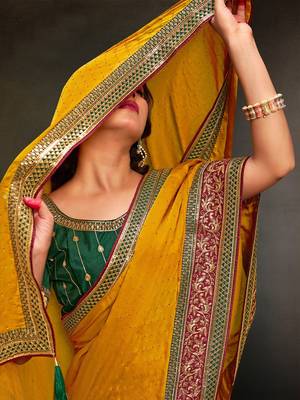 yellow ethnic motifs heavy work saree 1