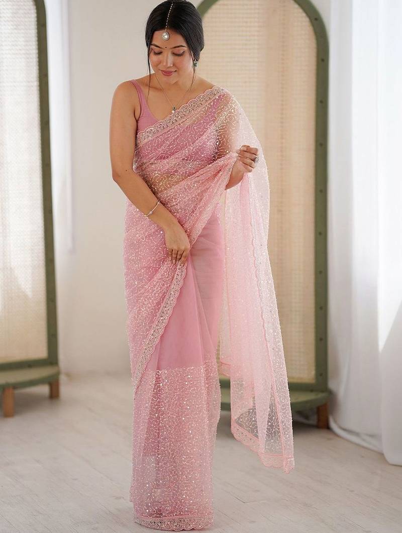 pink embellished sequinned net heavy work saree