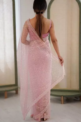 pink embellished sequinned net heavy work saree