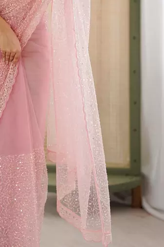 pink embellished sequinned net heavy work saree