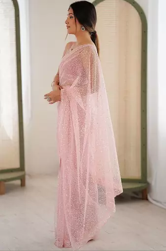 pink embellished sequinned net heavy work saree