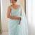 sea green embellished sequinned net heavy work saree