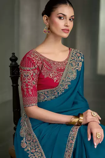 teal blue crape with georgette work blouse party wear saree