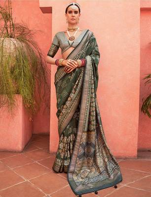 Green ethnic motifs zari silk blend banarasi saree 1