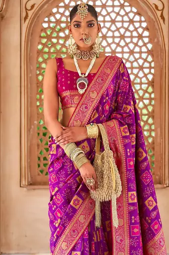 Purple woven design zari silk blend banarasi saree