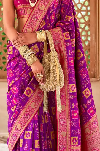 Purple woven design zari silk blend banarasi saree