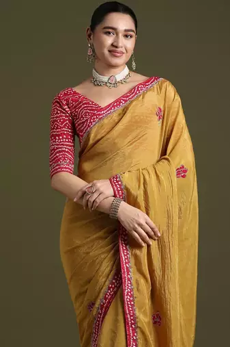 Mustard embellished sequinned tissue saree