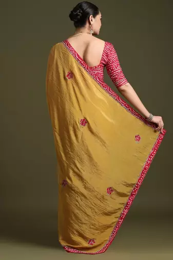 Mustard embellished sequinned tissue saree
