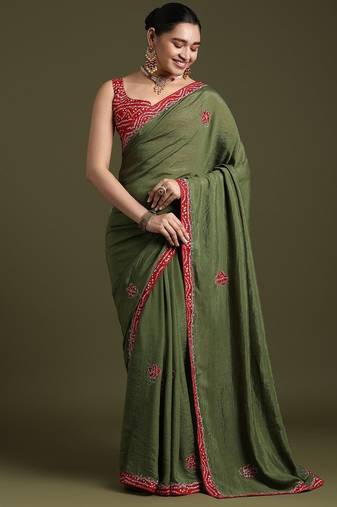 Green floral embroidered sequinned tissue saree with matching blouse