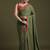 Green floral embroidered sequinned tissue saree with matching blouse