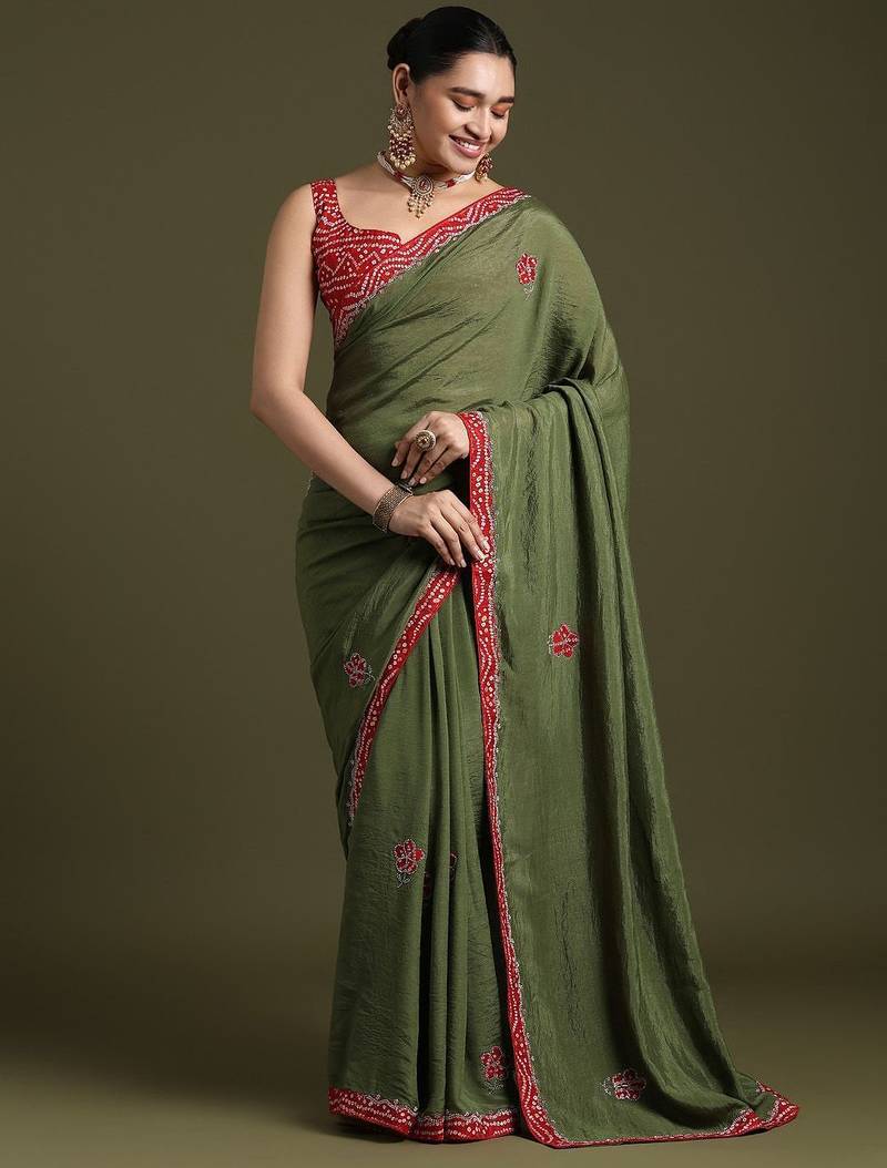 Green floral embroidered sequinned tissue saree with matching blouse