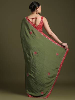 Green floral embroidered sequinned tissue saree with matching blouse 2