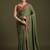 Green floral embroidered sequinned tissue saree with matching blouse