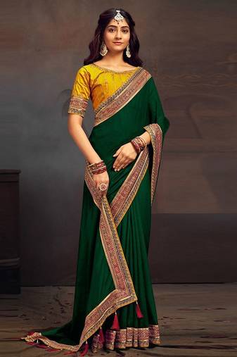 Green embroidered party saree