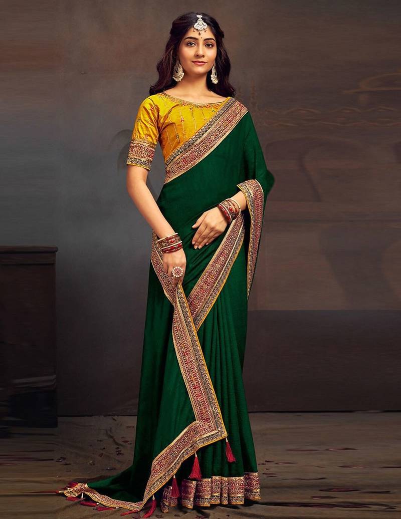 Green embroidered party saree