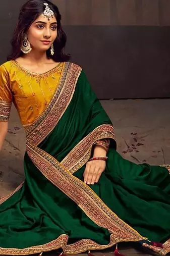 Green embroidered party saree