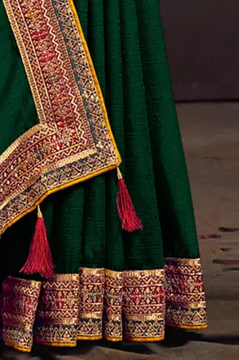 Green embroidered party saree