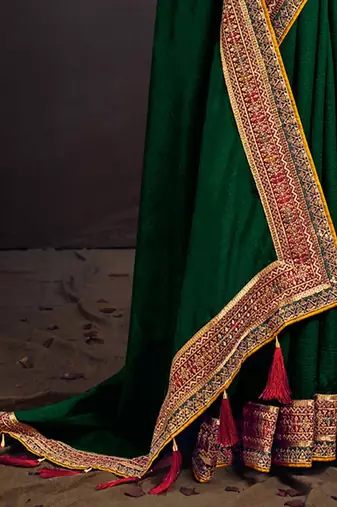 Green embroidered party saree