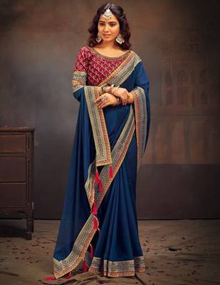 Teal embroidered party saree 1