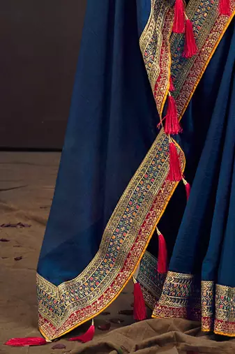 Teal embroidered party saree