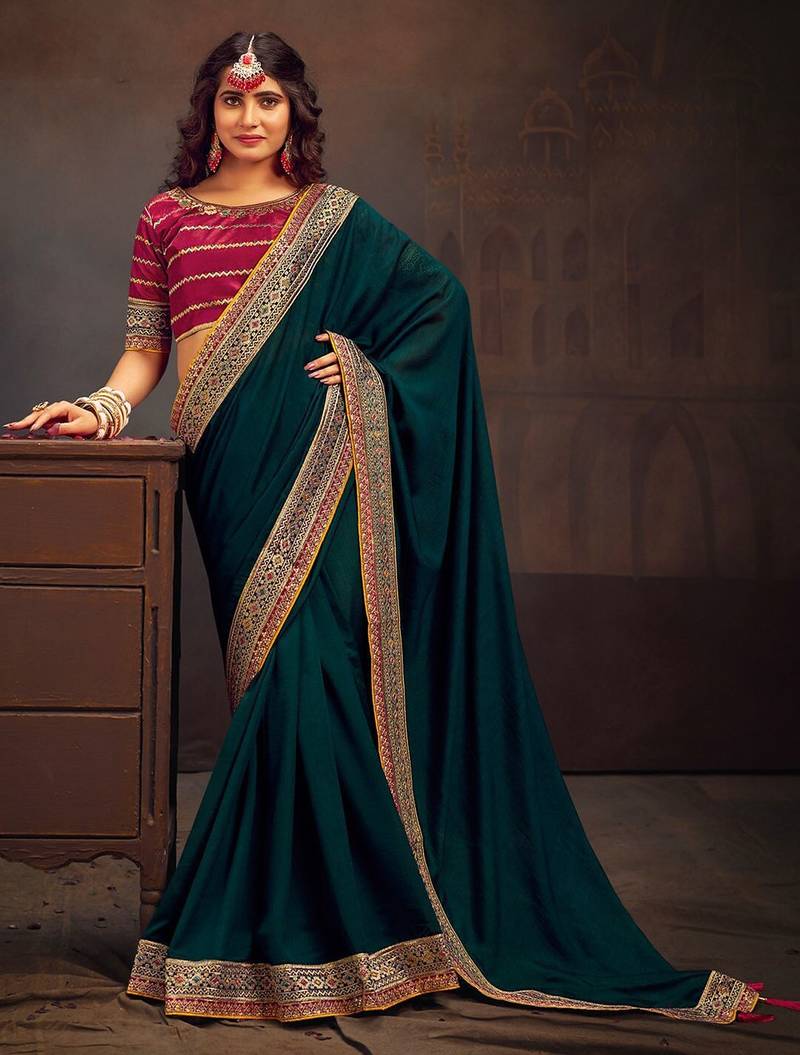Teal embroidered party saree