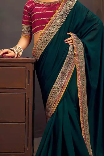 Teal embroidered party saree