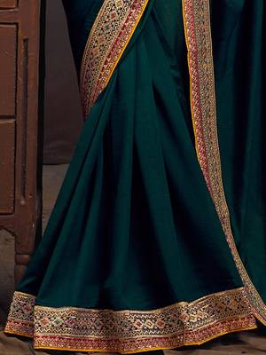 Teal embroidered party saree 4