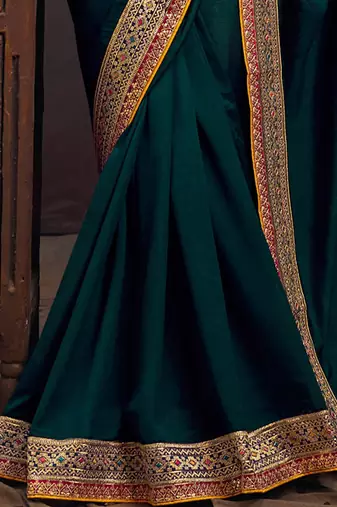 Teal embroidered party saree