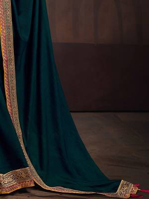 Teal embroidered party saree 5