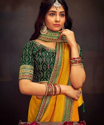 Yellow embroidered party wear saree 2