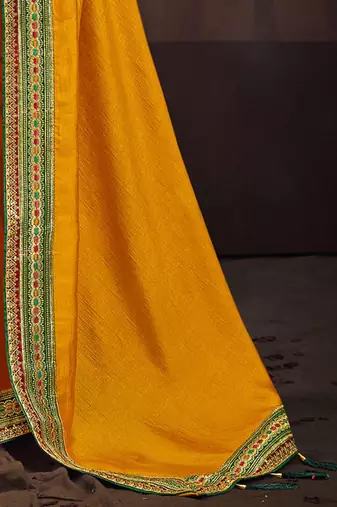Yellow embroidered party wear saree